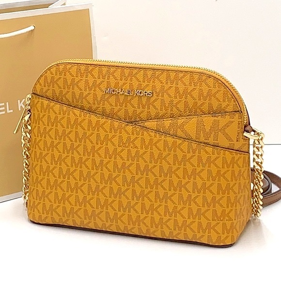 Michael Kors Handbags - Michael Kors Medium Dome Xcross Xbody Bag
Color: Marigold Multi